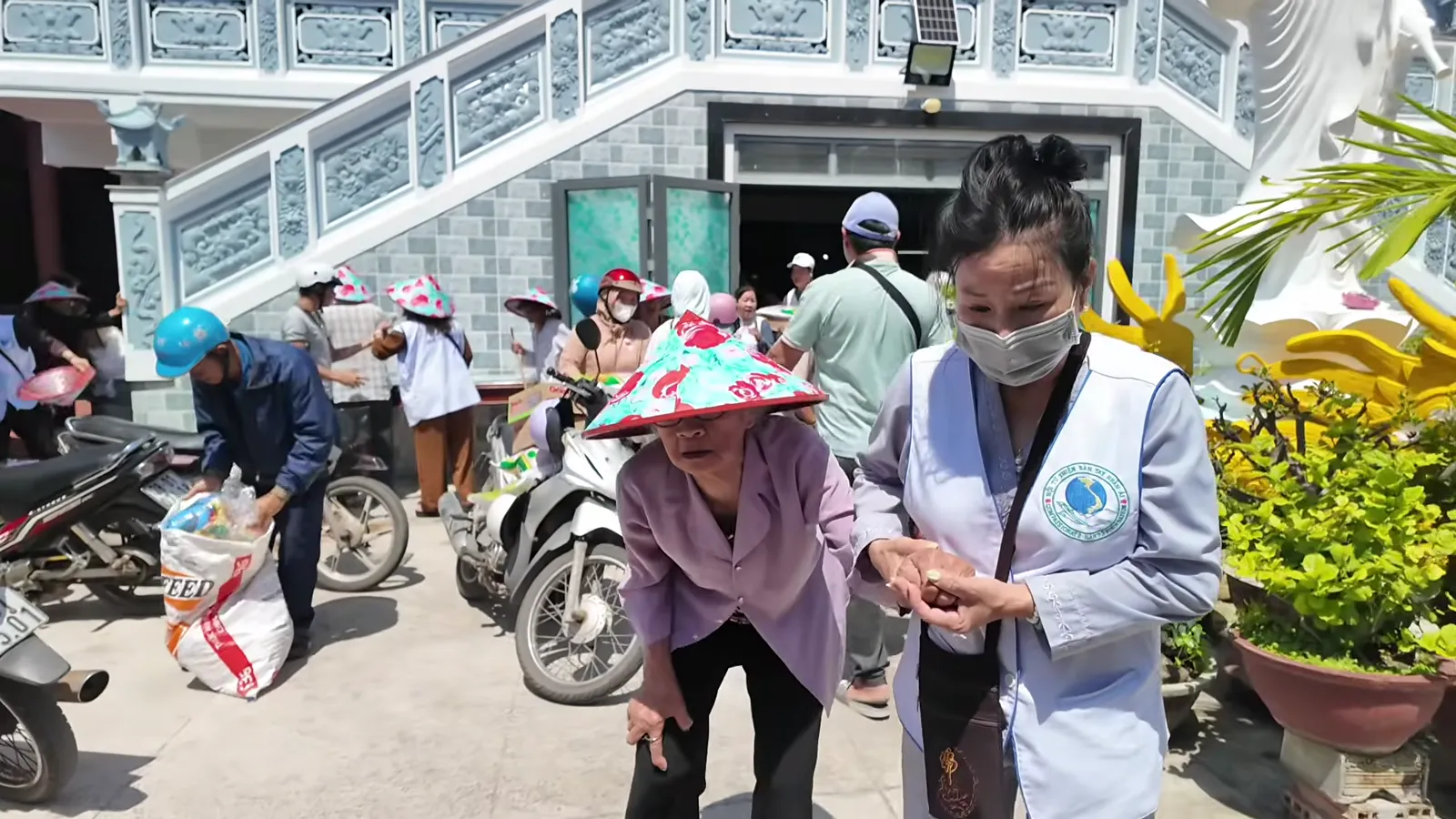 Receiving rice at Diệu Tịnh Pagoda, Phú Yên, March 2026.